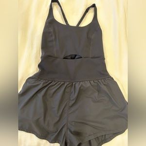 Free people movement onesie. Size small. 70$. Worn once.